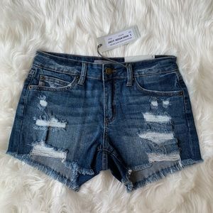 NWT Medium Wash Open and Fringe Hem Shorts